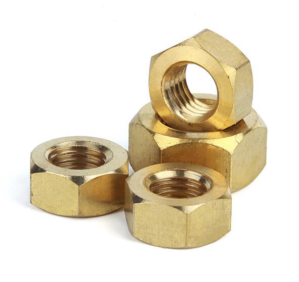 Four brass hex nuts